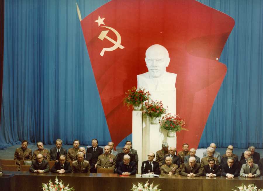 В президиуме торжественного заседания.Бритвин (первый во втором ряду) - заместитель начальника войск